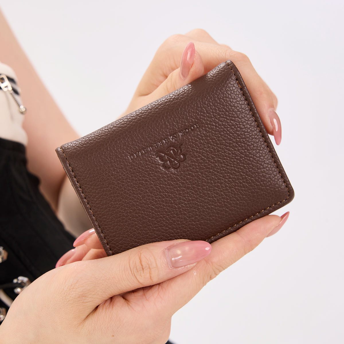 Rock & Republic Studded Border Flap Wallet in Coffee PU rear detail view showing embossed logo on bifold wallet profile.