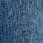 Close-up fabric texture of Rock & Republic Women's Fever Legging in Last Call medium indigo marbleized acid denim wash.