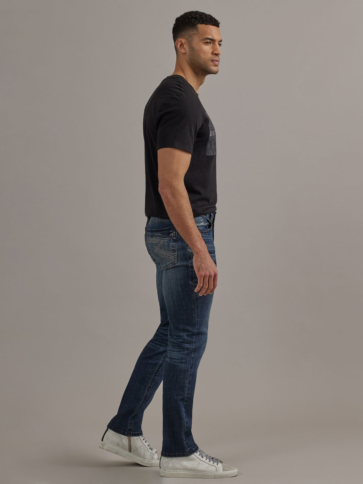 Side profile view of Rock & Republic Neil straight jeans in Street Cred highlighting classic straight leg silhouette.