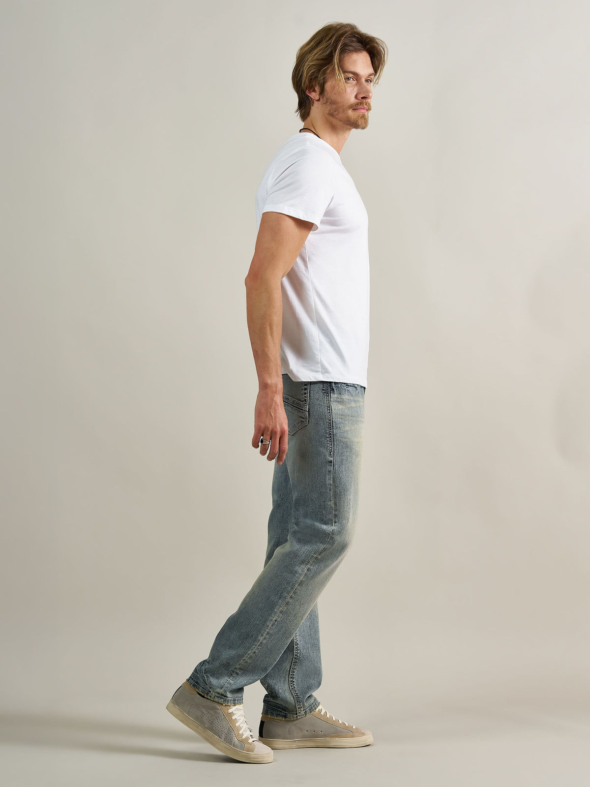 Side profile view of Rock & Republic Neil straight jeans in Haze highlighting effortless classic straight leg silhouette.