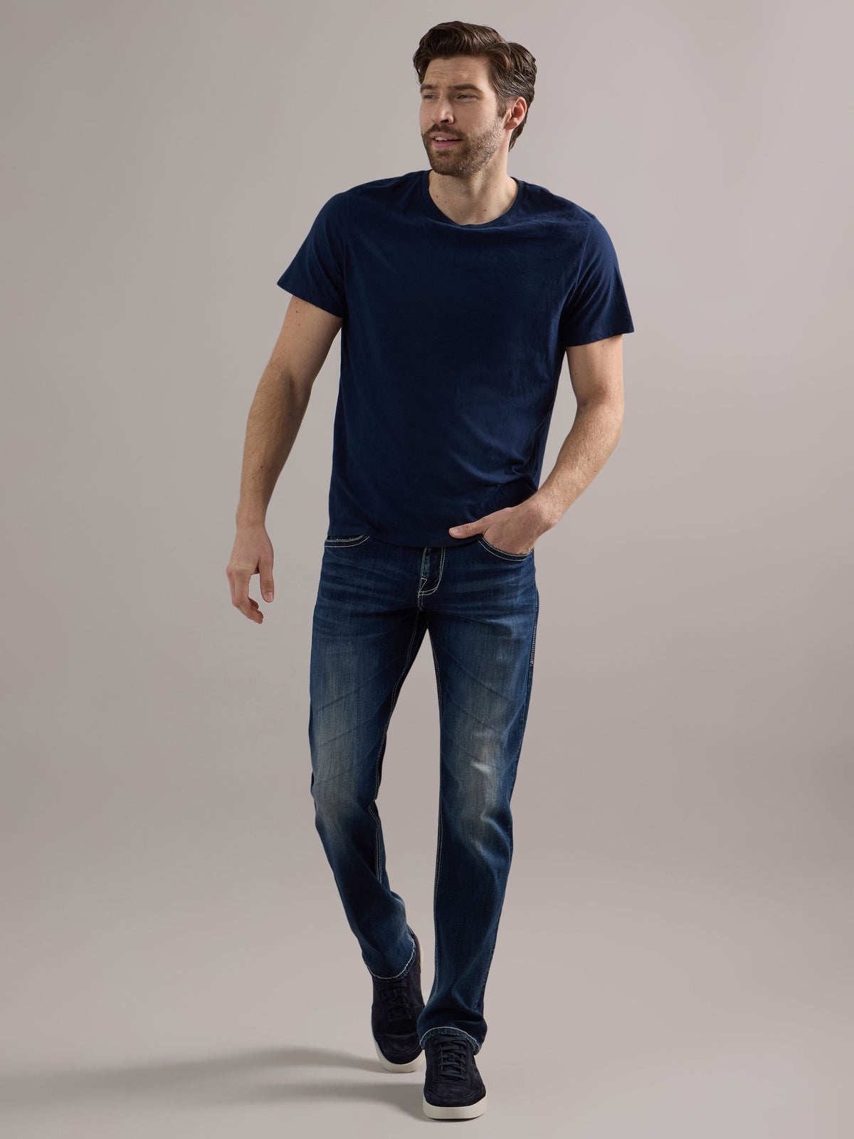 Front full view of Rock & Republic Colburg slim straight jeans in Mad Skills featuring heavily worn dark wash & whiskering