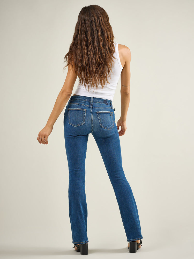 Back full view of Rock & Republic Kasandra bootcut jeans in Stunner showing contoured rear pockets and bootcut flare hem.