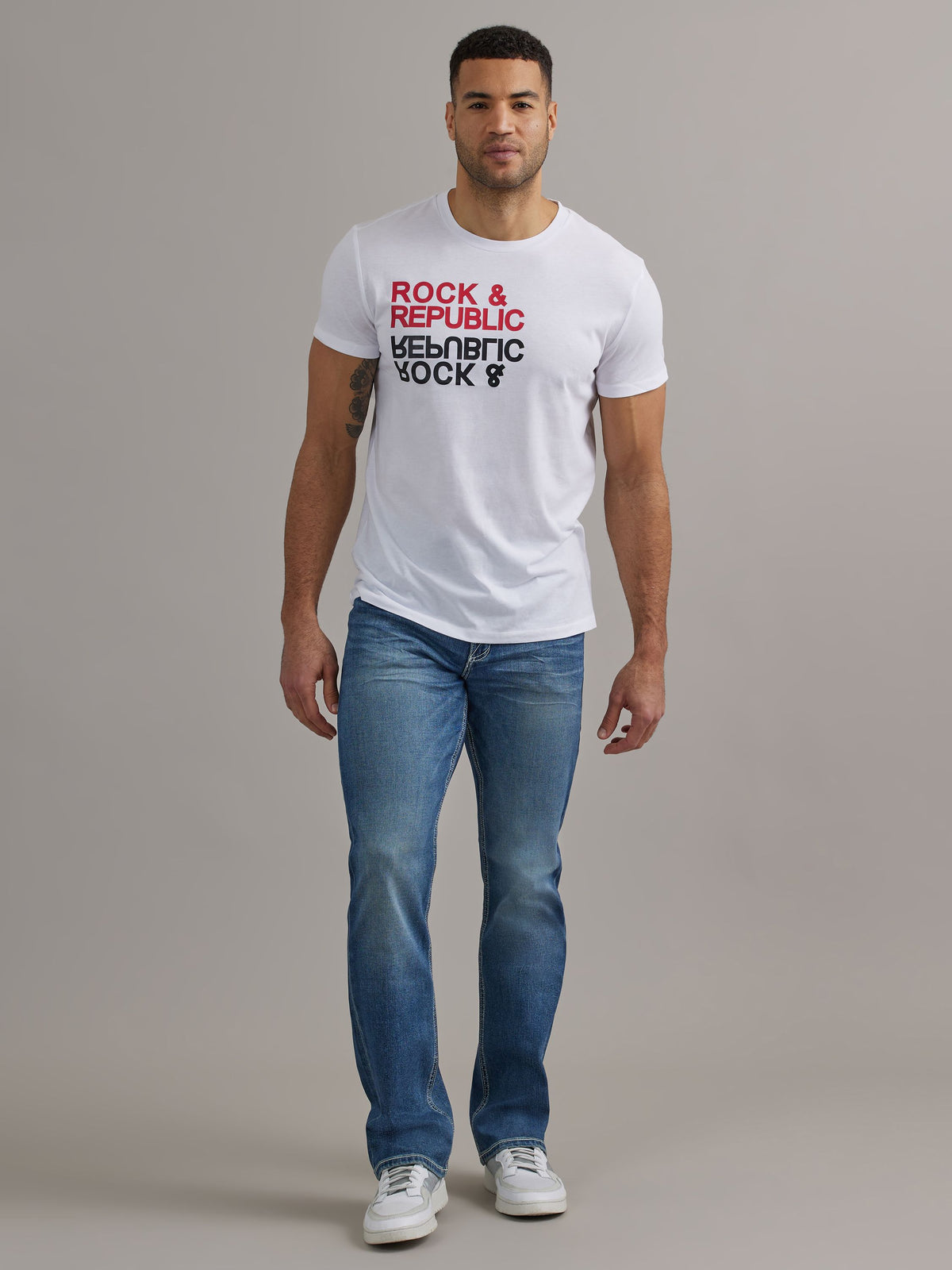 Front full view of Rock & Republic Henlee bootcut jeans in Denied featuring mid-blue wash and defined thigh fading.