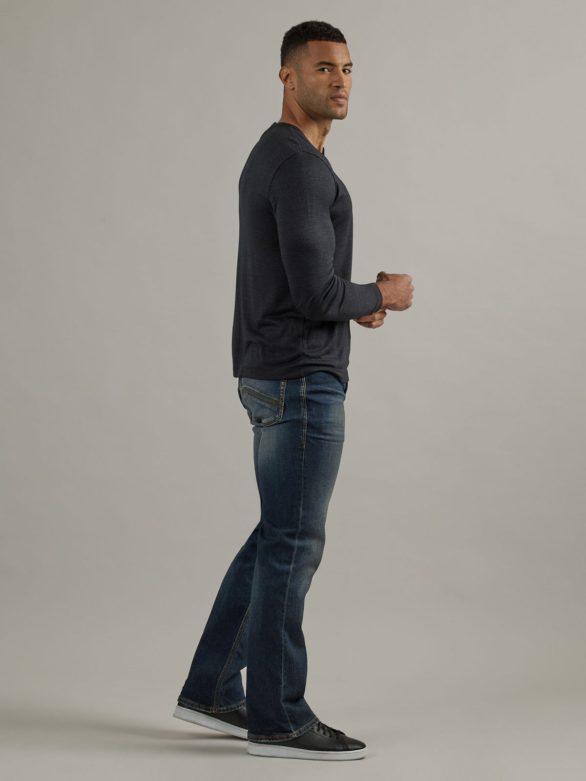Side profile view of Rock & Republic Henlee bootcut jeans in Rocky Road highlighting classic sculpted bootcut silhouette.