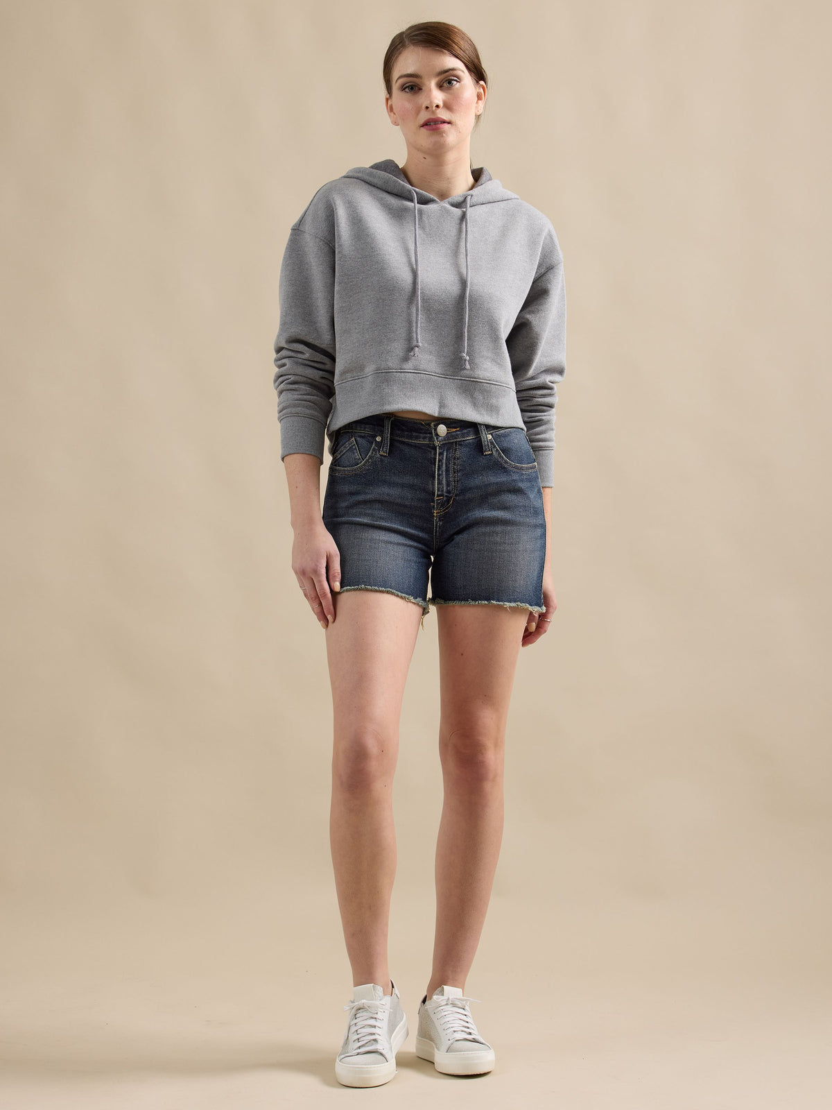 Front view of Rock & Republic Hula Short in It Girl dark wash showing classic five-pocket design and raw cut-off hem.