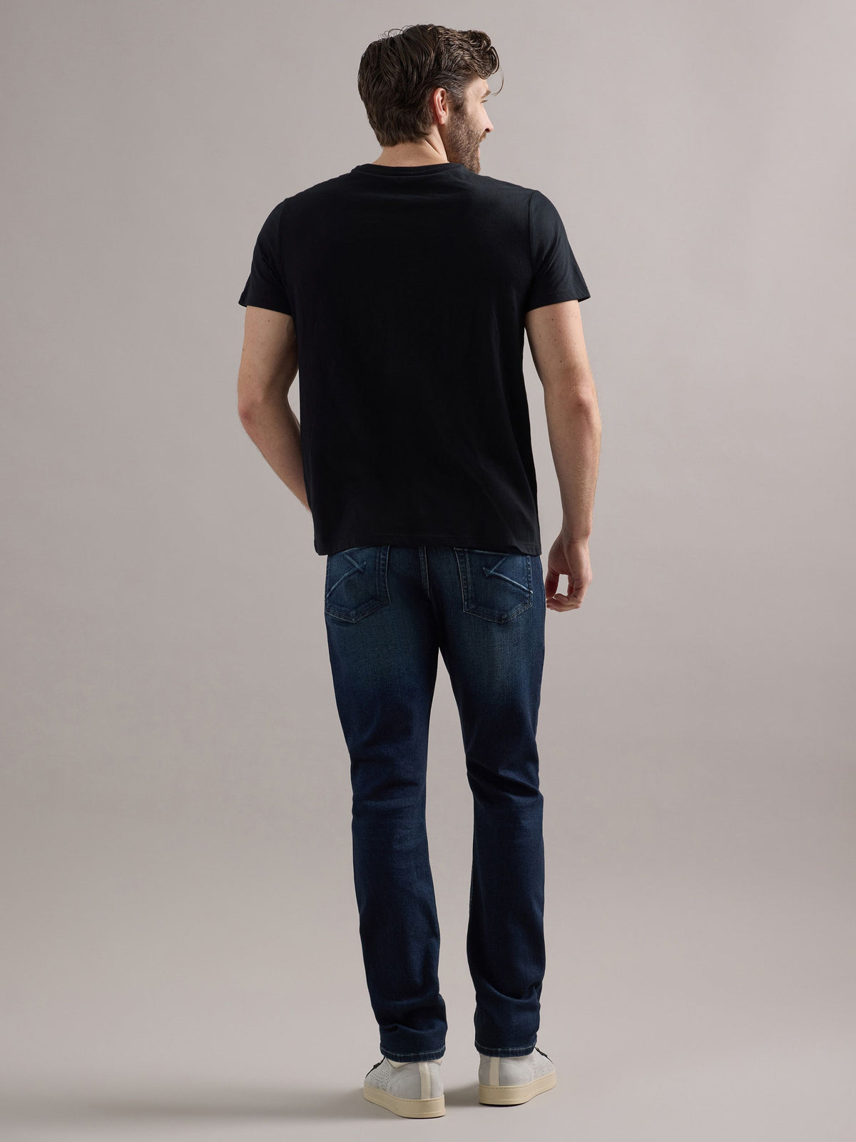 Back view of Rock & Republic Colburg slim straight jeans in Salute highlighting tailored rear fit and clean dark rinse wash.