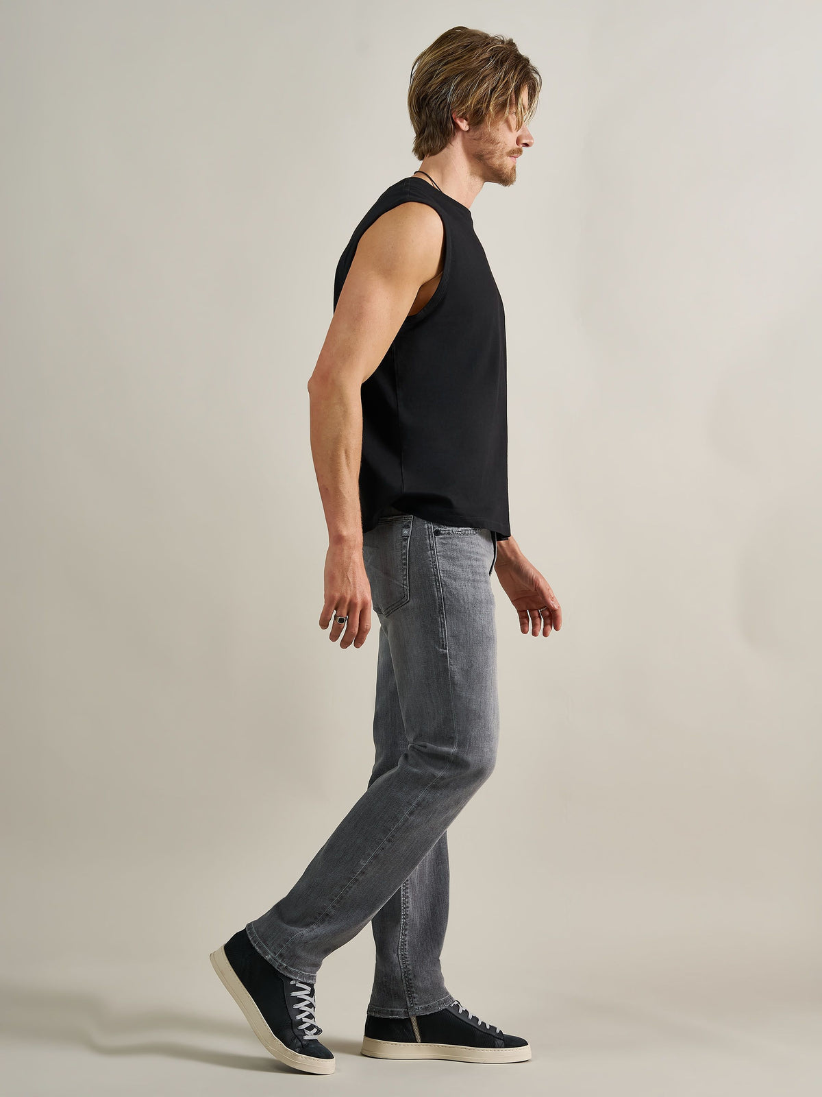 Side profile view of Rock & Republic Neil straight jeans in Toner Low highlighting effortless classic straight leg fit.