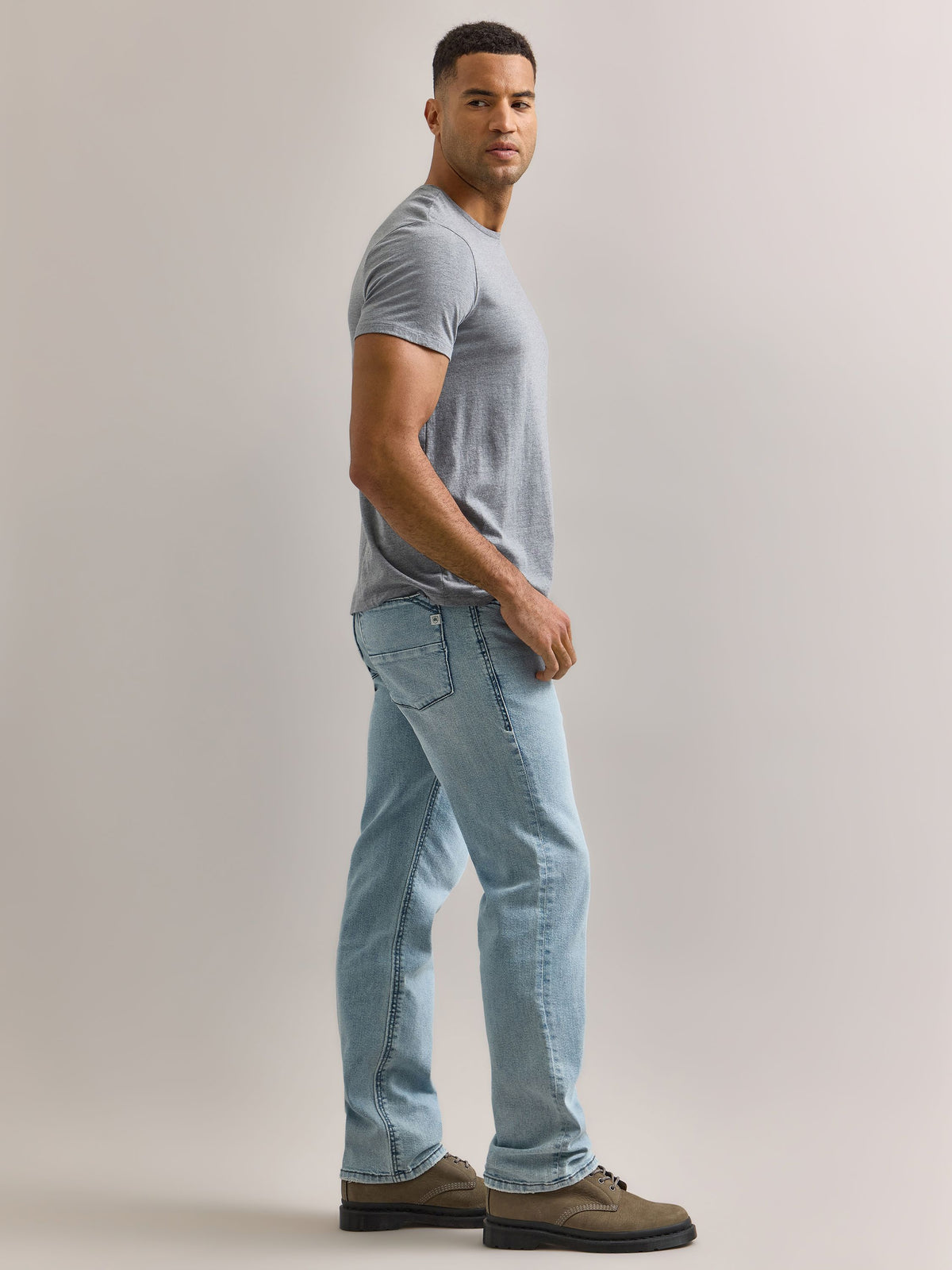 Side profile view of Rock & Republic Grady relaxed straight jeans in Blue Ashes highlighting relaxed straight leg fit.