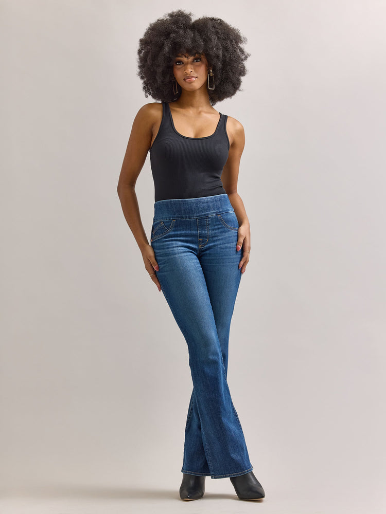 Front full view of Rock & Republic Fever pull-on bootcut jeans in Heartfelt featuring soft fading and wide waistband.