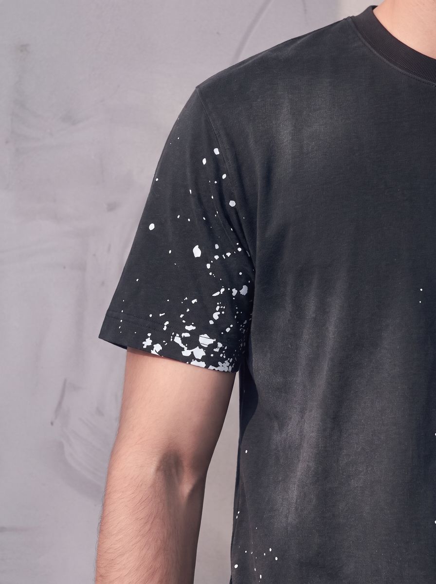 Rock Graphic T-Shirt with Distressed Paint Splatter Detail