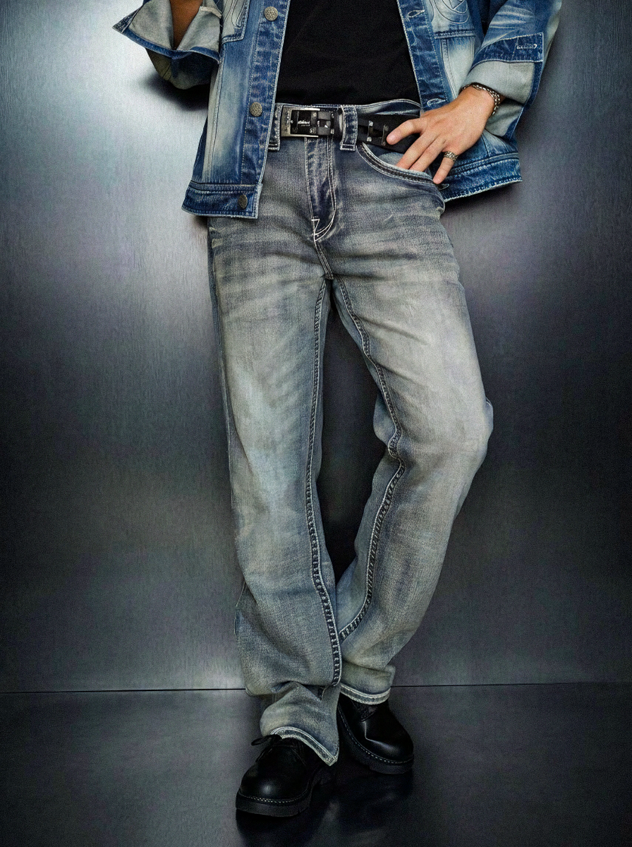 Full front view of Rock & Republic Grady relaxed straight jeans in Stay True styled with denim jacket and stacked hemline.