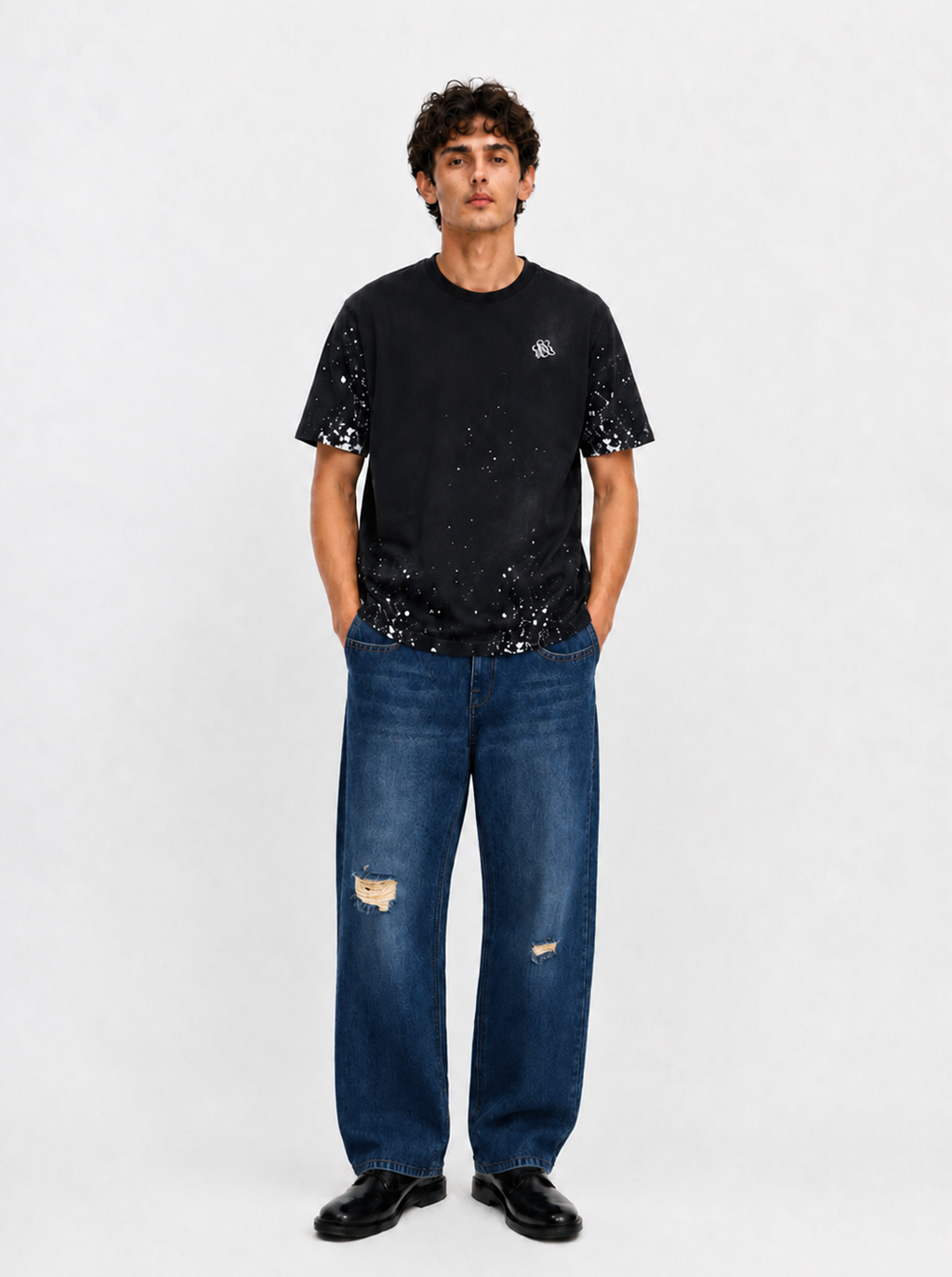 Baggy Jeans with Distressed Knee Details and Leather Back Patch