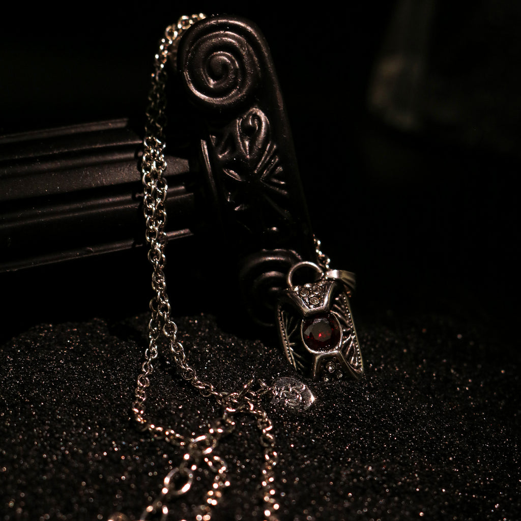 Crimson Relic Garnet Lock Necklace