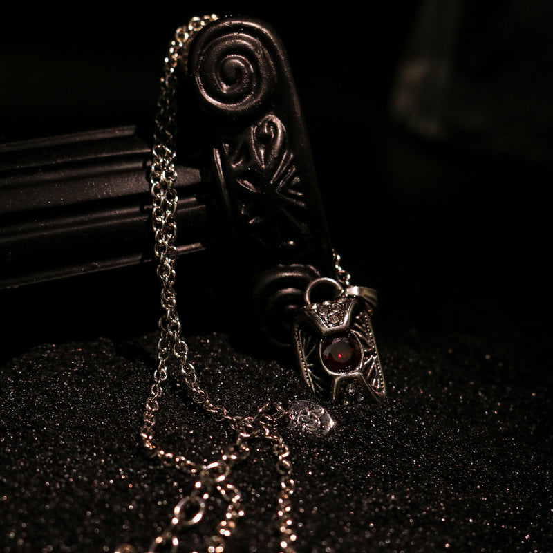 Crimson Relic Garnet Lock Necklace