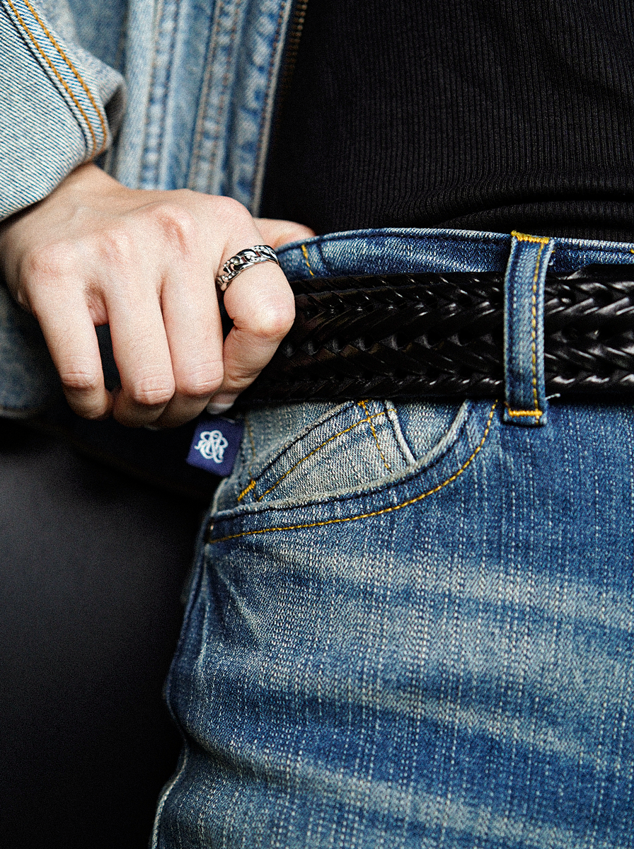 Detailed waist view of Rock & Republic Kasandra jeans in VIP Status highlighting coin pocket with signature blue RR logo tab.