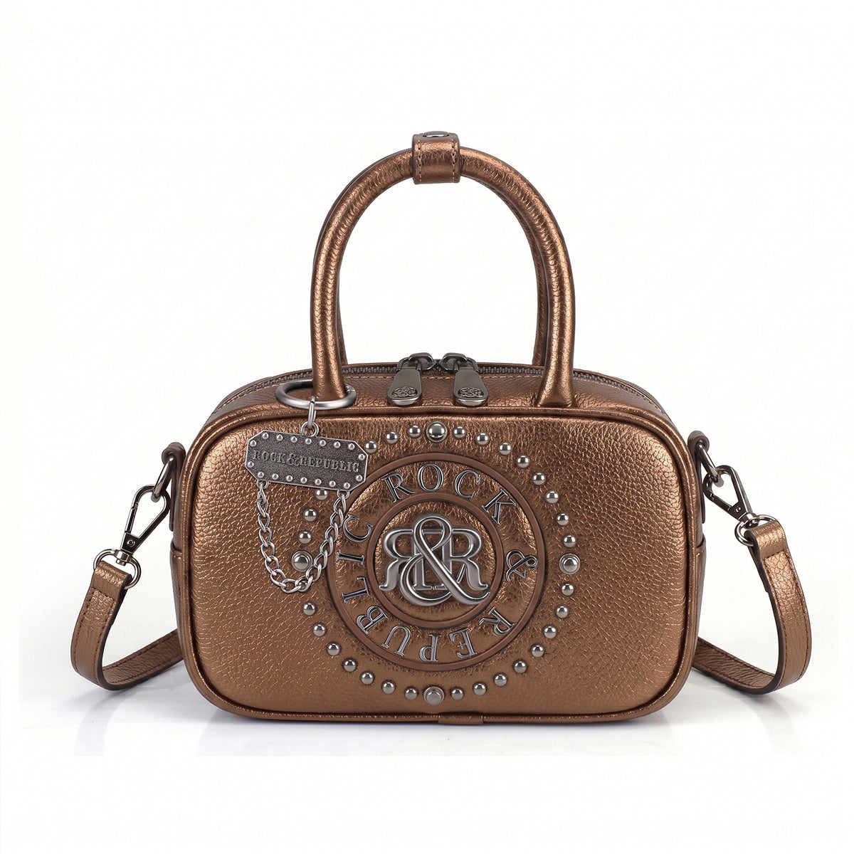 Rock & Republic Studded Logo Medallion Satchel Bag in Bronze PU leather with medallion and satchel silhouette.