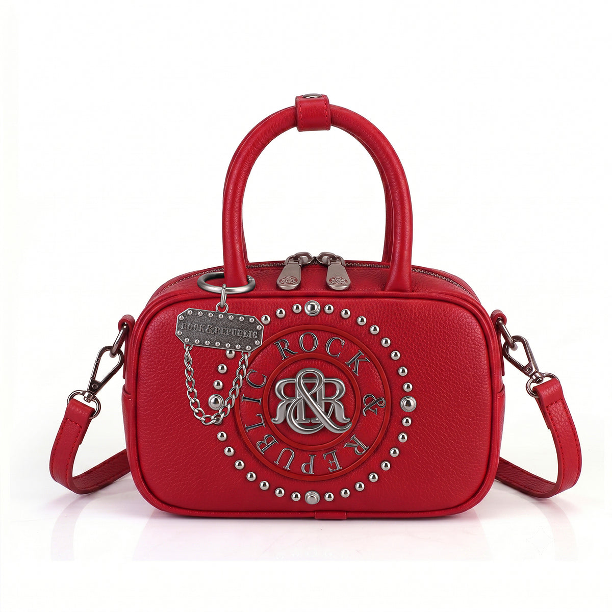 Rock & Republic Studded Logo Medallion Satchel Bag in Red PU leather with medallion and satchel silhouette.