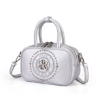 Rock & Republic Studded Logo Medallion Satchel Bag in Silver PU leather with medallion and satchel silhouette.
