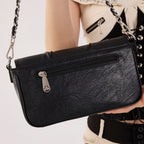 Rock & Republic Shield Logo Ruched Crossbody Bag in Black PU detail view showing chain on crossbody shape.
