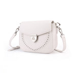 Rock & Republic Shield Lock Saddle Crossbody Bag in White PU perspective view showing structured saddle crossbody shape.