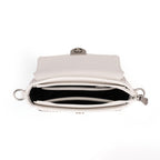 Rock & Republic Shield Lock Saddle Crossbody Bag in White PU top view showing interior compartment on saddle bag shape.