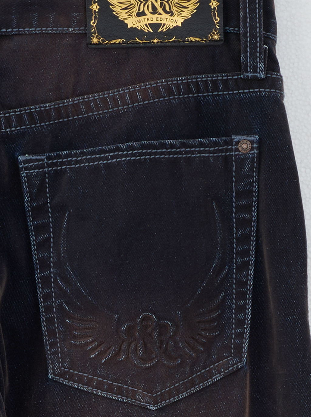Rowan Embossed R Barrel Leg Jean